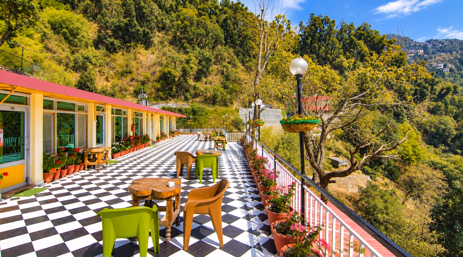 The terrace at The Sky Hotels in daylight, looking down the valley