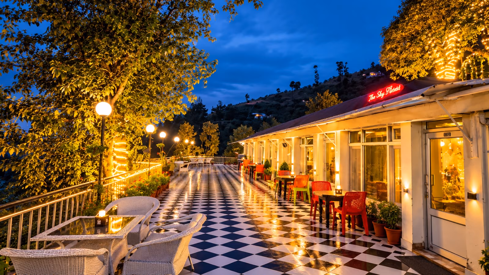 The terrace at The Sky Hotels lit at dusk