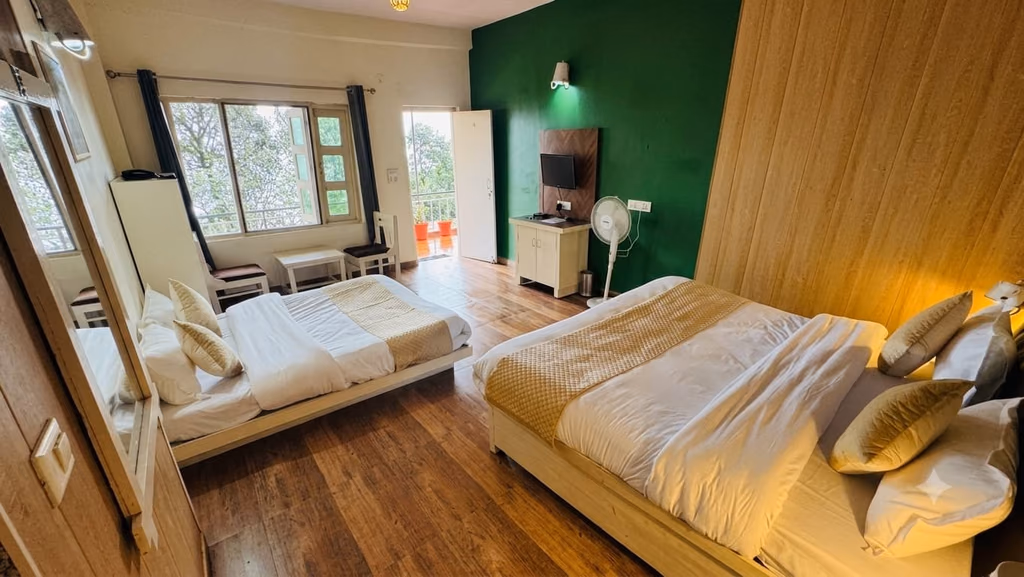 Deluxe room 203 twin beds beside the window