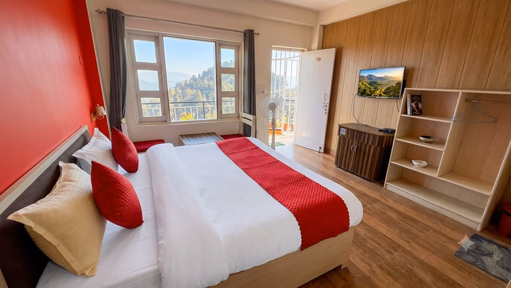 Standard room 201 with the valley through the corner window