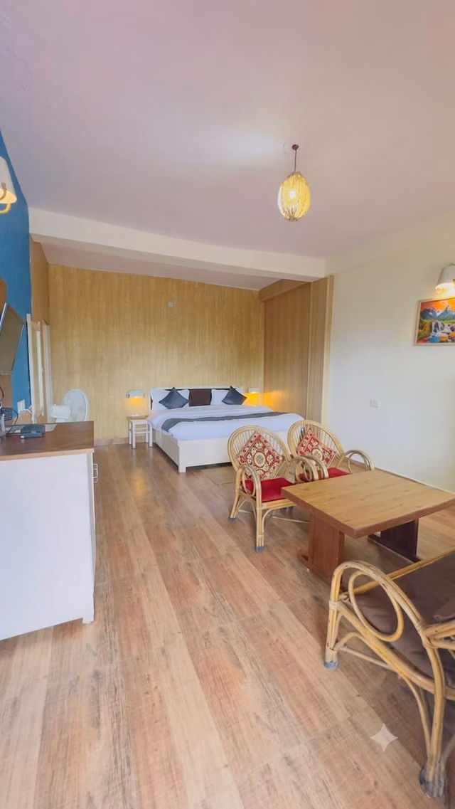 Standard room 202 bed with blue furnishings
